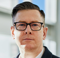 Alexander Hughes, PDG d'une entreprise spécialisée dans les cryptomonnaies, portrait